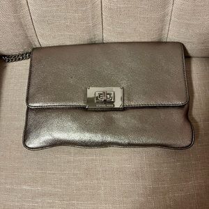Michael Kors silver large clutch/shoulder bag